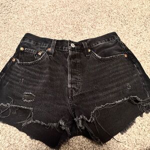 Black distressed Levi shorts